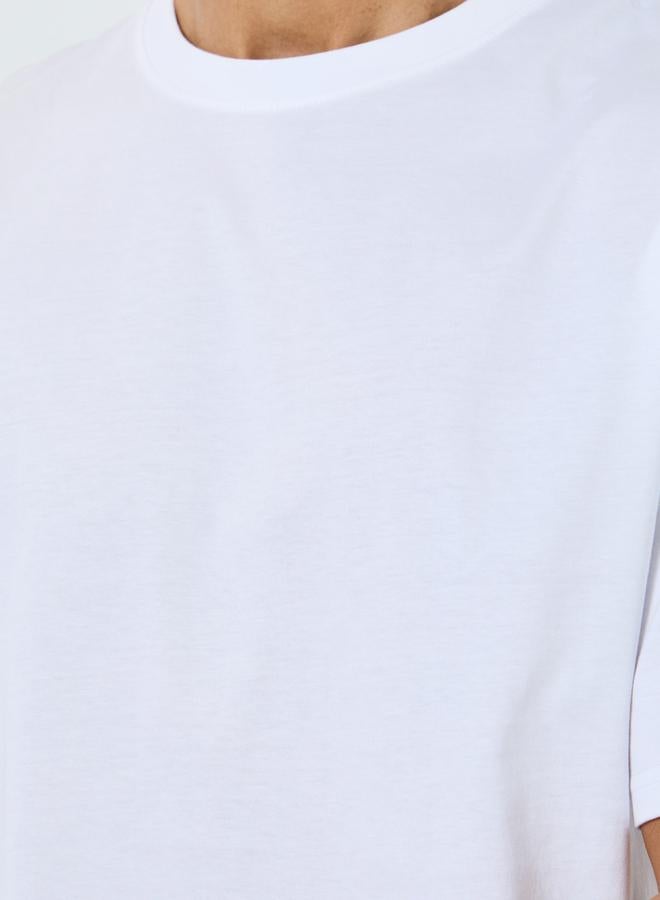 ستايلي تيشيرت جيرسي ثقيل بقصة واسعة وطبعة شعار - Image 3